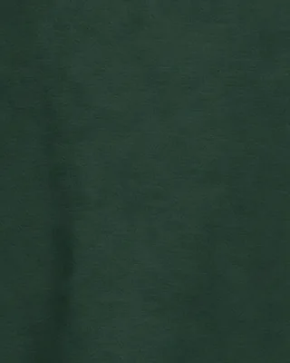 Close view of 240 gsm jersey on the body of the Tee 240 in Wild Green.